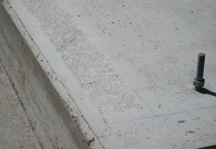 Closeup of Concrete Foundation Scabbling