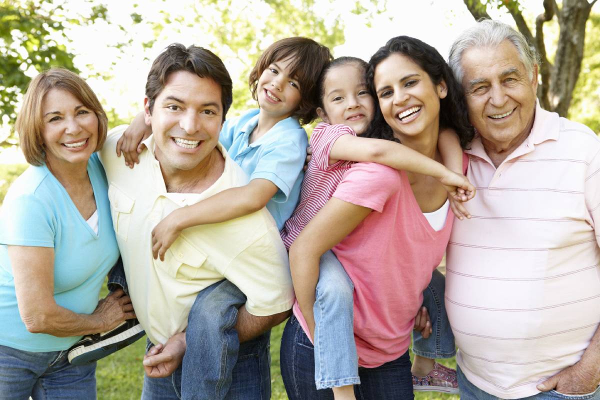 A happy family showing the parents, children, and grandparents