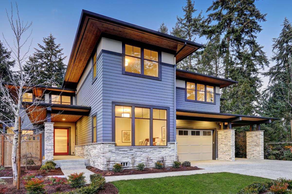 Beautiful new house with blue exterior paint and stone work