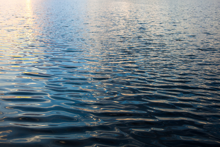 Rippling Water Surface with Light Reflections
