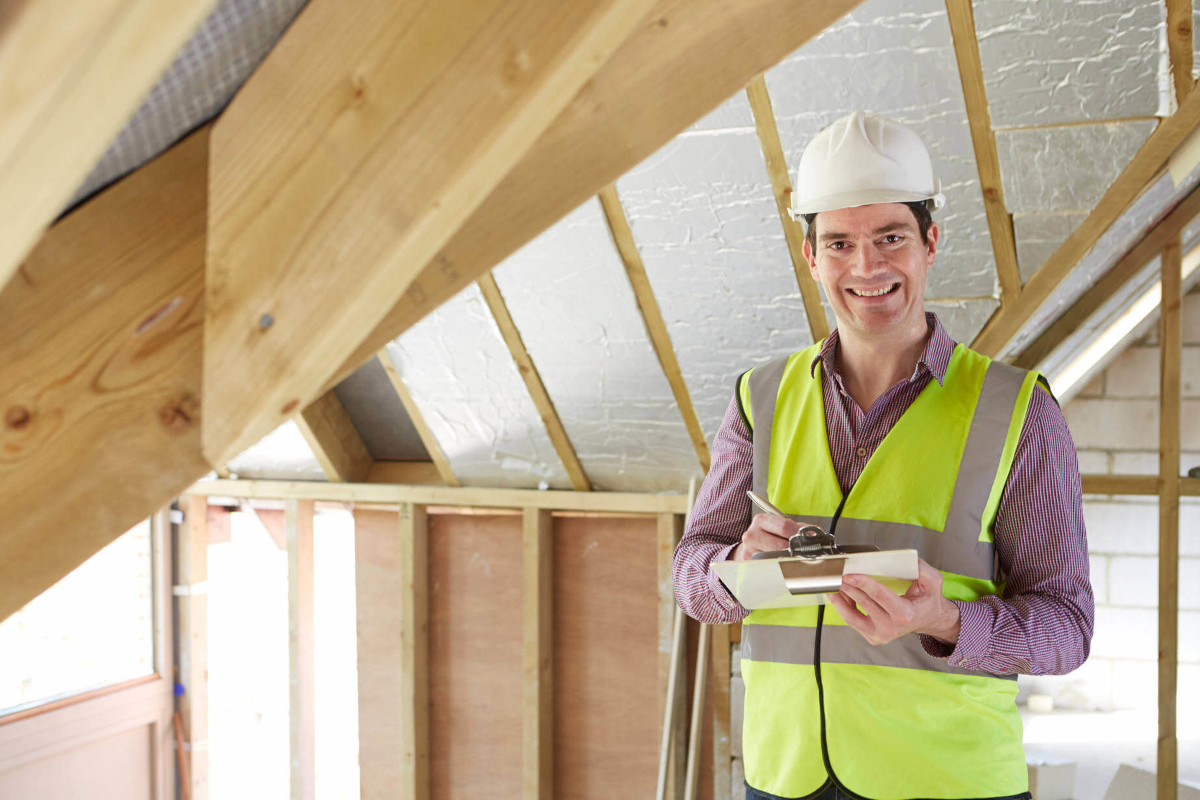 Construction worker going trough documents