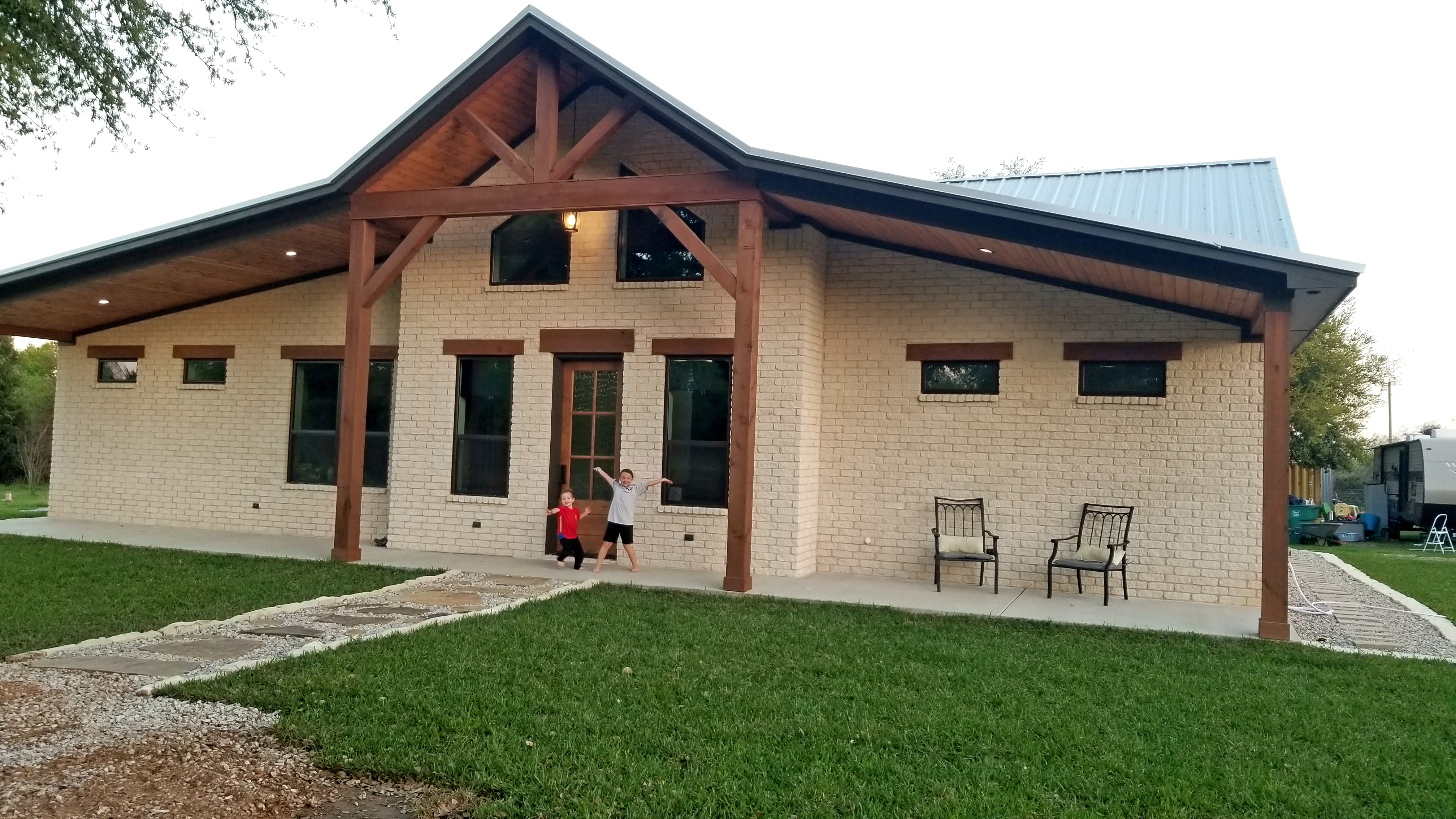 Front of a new home built by Owner Builder Network