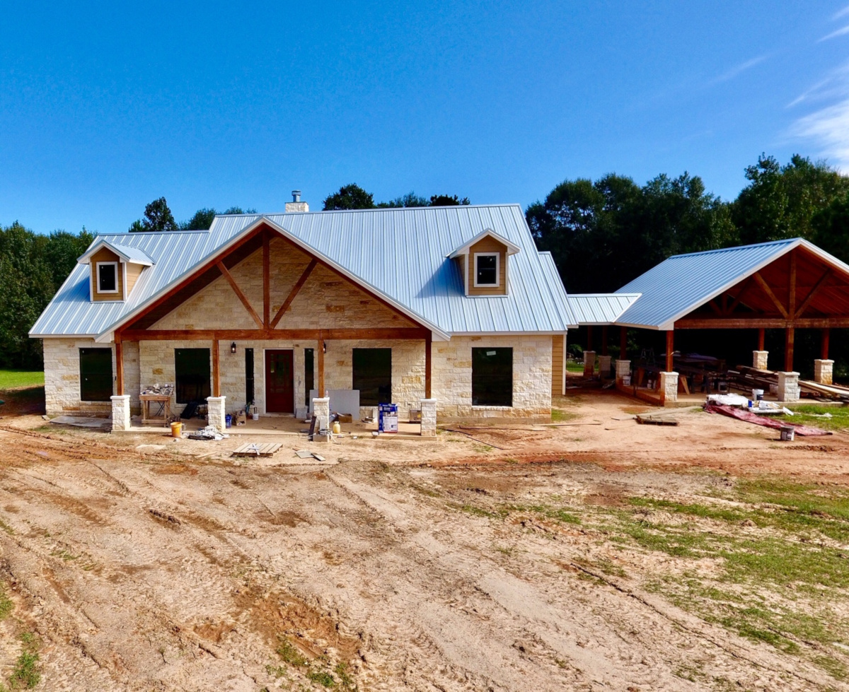 Front of a new home built by Owner Builder Network