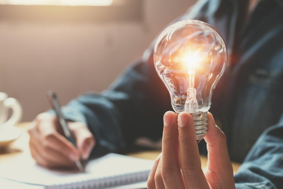 Man holding a lightbulb